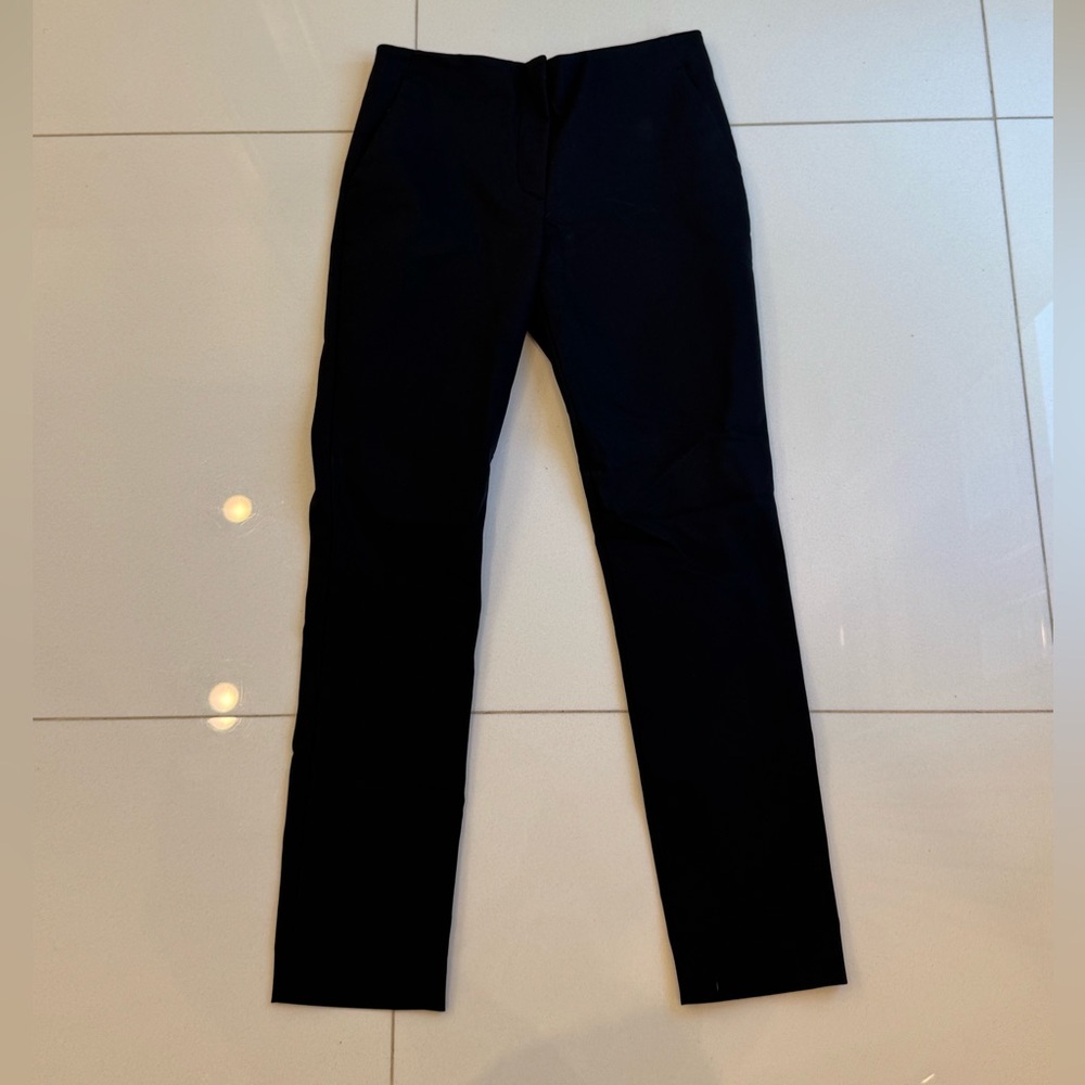 The Row Black Dress Pants with Tailored Silhouette